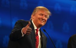 BOULDER, CO - OCTOBER 28: Presidential candidate Donald Trump gives a thumbs up during the CNBC Republican Presidential Debate at University of Colorados Coors Events Center October 28, 2015 in Boulder, Colorado. Fourteen Republican presidential candidates are participating in the third set of Republican presidential debates. (Photo by Justin Sullivan/Getty Images)