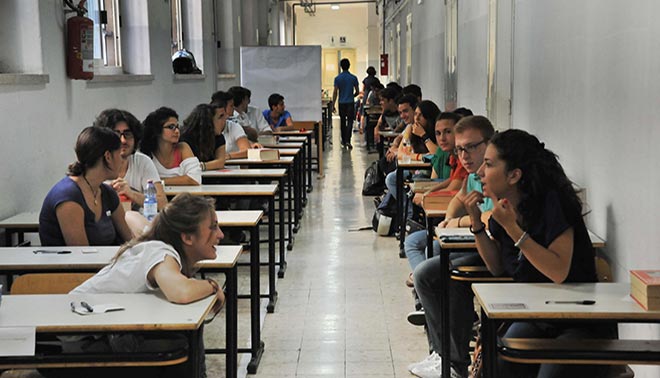 università